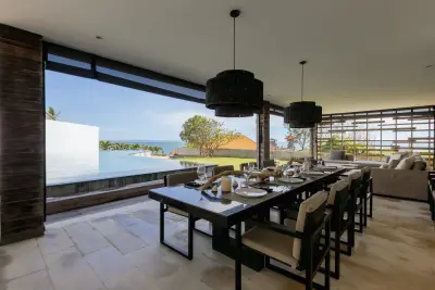 dining-area-by-the-main-pool-luxury-beachside-villa-1-2