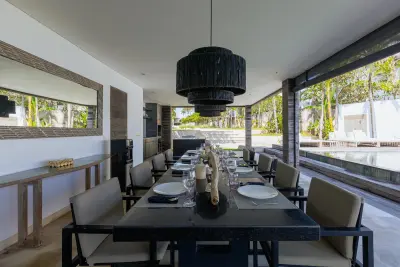 dining-area-by-the-main-pool-luxury-beachside-villa-2-2
