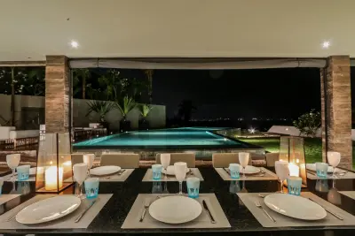 dining-area-by-the-main-pool-luxury-beachside-villa-4